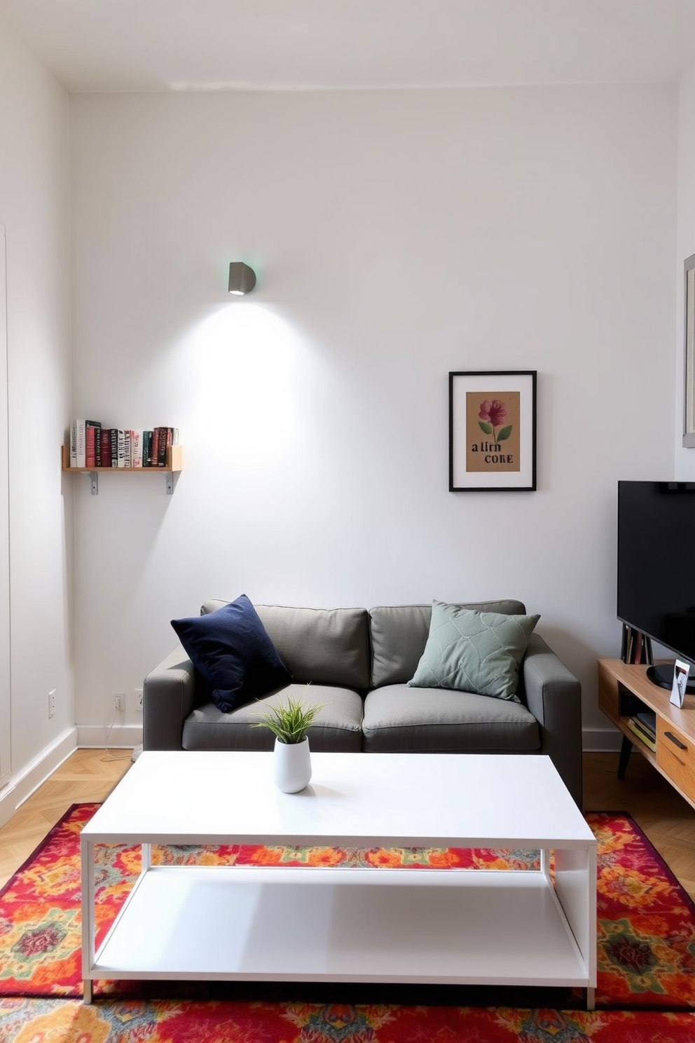 A cozy small apartment living area features a comfortable sectional sofa in a soft gray fabric, complemented by a round wooden coffee table in the center. A large window lets in natural light, and a sliding door to the side leads to a compact balcony, providing a private outdoor space. The kitchen area boasts sleek white cabinetry with brass handles, and a small island with bar stools for casual dining. A stylish pendant light hangs above the island, enhancing the modern aesthetic of the space.