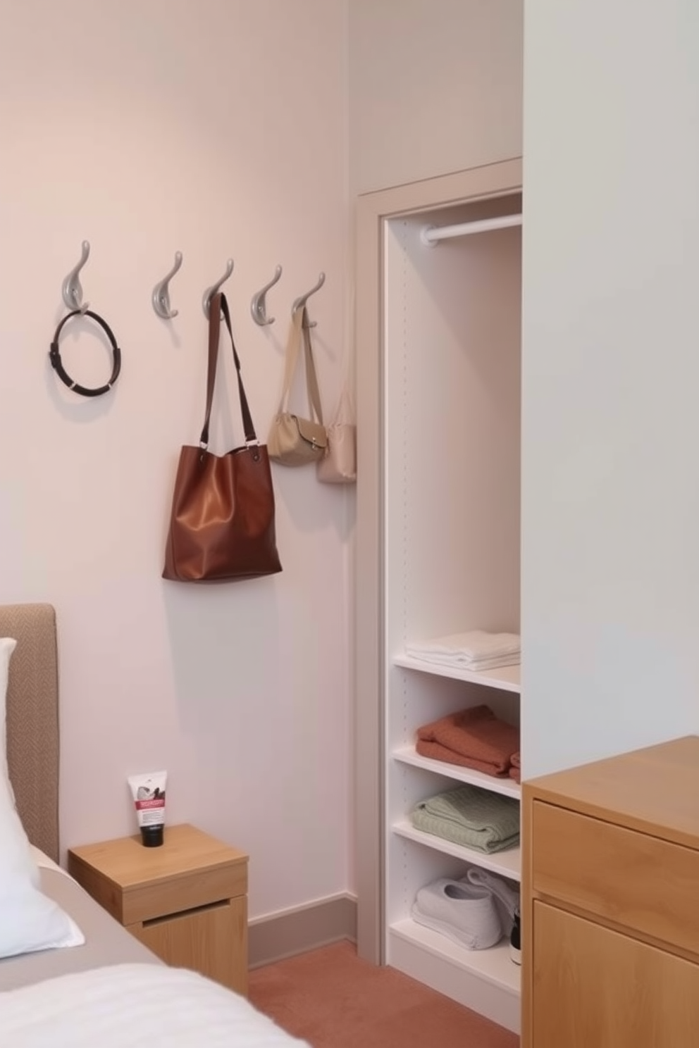 A cozy bedroom featuring a small closet with sliding doors. The walls are painted in a soft beige tone, and the floor is adorned with a plush area rug. In one corner, there is a comfortable bed with a stylish headboard and crisp white linens. A small ottoman is placed at the foot of the bed, providing additional seating and a touch of elegance.