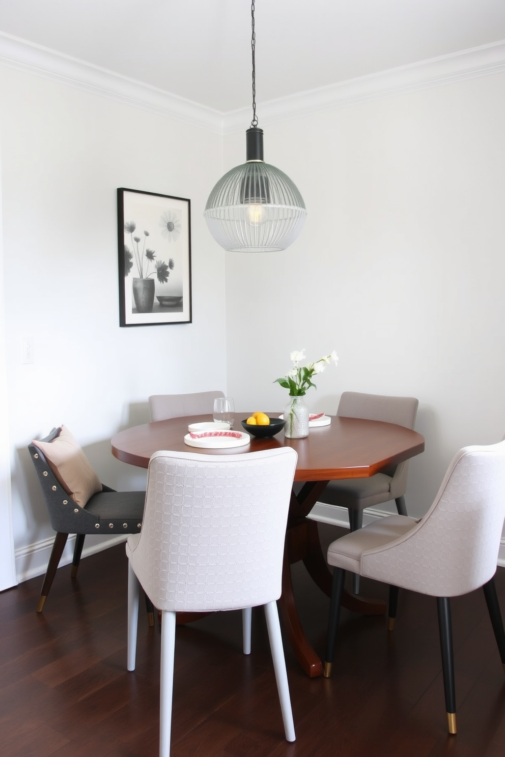 A cozy nook features a built-in bench adorned with plush cushions in soft pastel colors. A round wooden table sits in front of the nook, surrounded by four elegant dining chairs, creating an inviting space for meals and conversation. The walls are painted in a warm beige tone, enhancing the room's warmth and charm. A statement pendant light hangs above the table, providing soft illumination and adding a touch of sophistication to the small dining area.