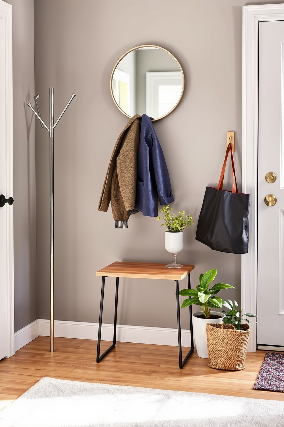 A compact side table designed for essentials is placed against the wall, featuring a sleek wooden surface and minimalist metal legs. Above the table, a small round mirror is mounted, reflecting the natural light from a nearby window. The entryway is adorned with a soft area rug that adds warmth, while a stylish coat rack stands to one side for convenience. Potted plants are positioned near the entrance, bringing a touch of greenery and life to the space.