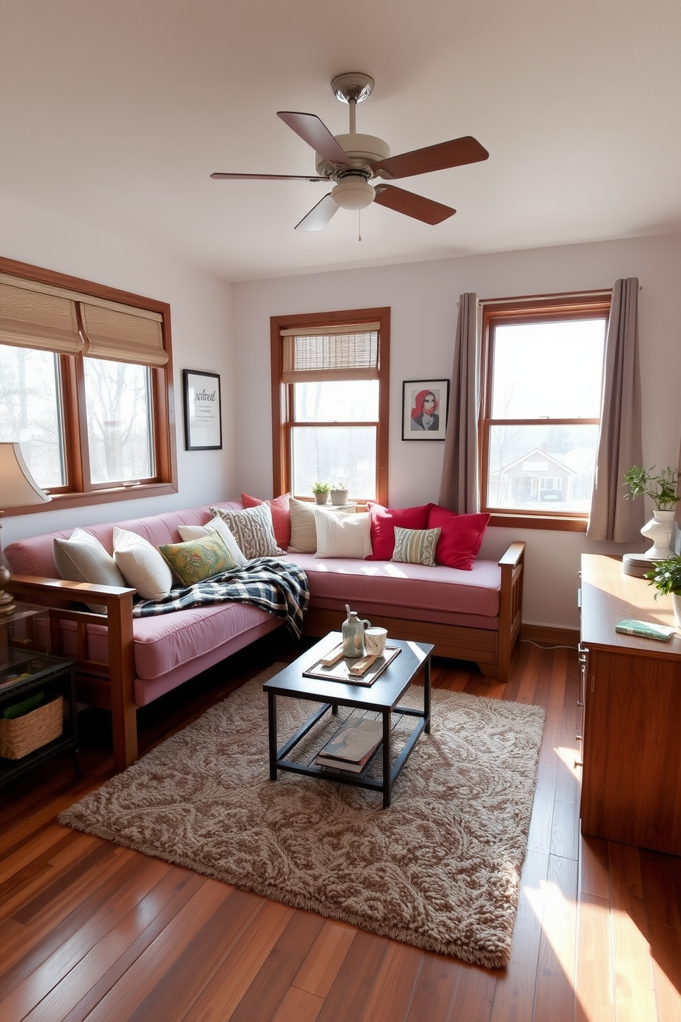 A cozy small family room featuring a versatile daybed that serves as both a seating area and a sleeping space. The room is decorated with soft, neutral tones and accented with colorful throw pillows to create a welcoming atmosphere. In one corner, a small coffee table sits atop a plush area rug, providing a perfect spot for snacks and drinks. Large windows allow natural light to flood the space, enhancing the warmth of the wooden furniture and inviting decor.