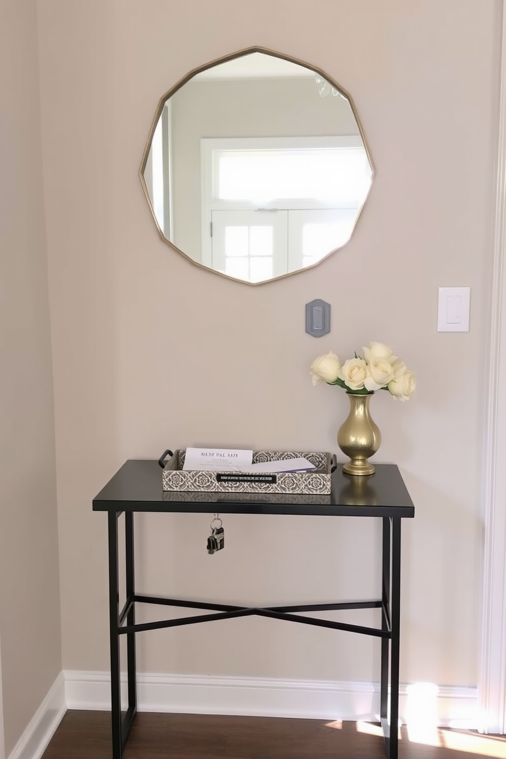 A small foyer features a stylish console table adorned with a decorative tray that holds keys and mail. The walls are painted in a soft neutral tone, complemented by a chic mirror above the table that reflects natural light.