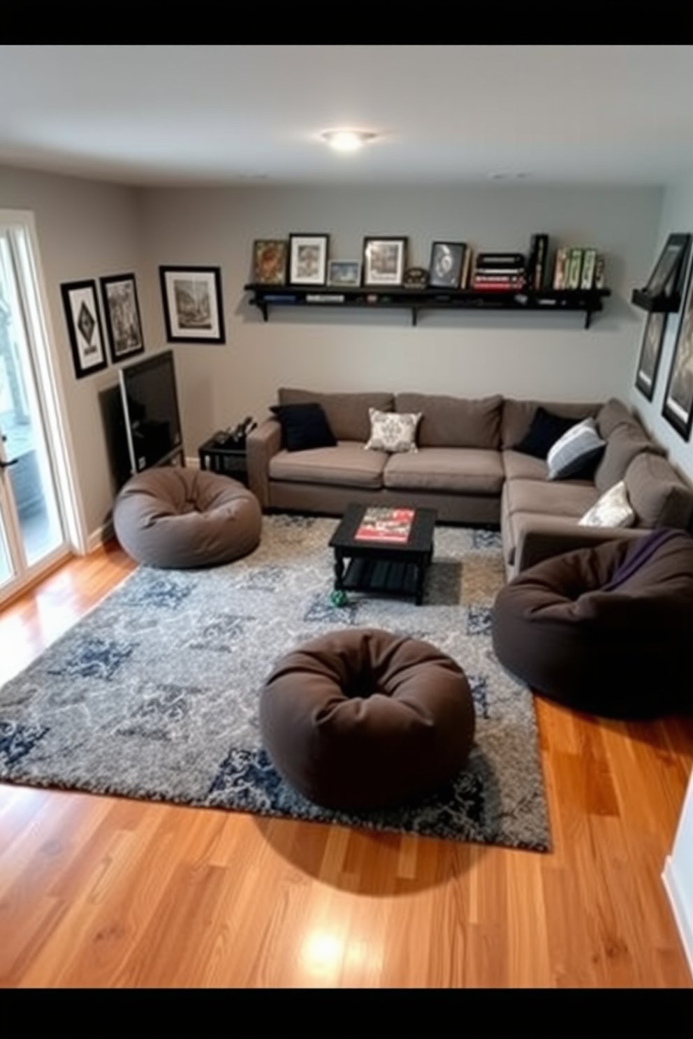 A cozy small game room featuring colorful cushions scattered across a plush sectional sofa. The walls are adorned with playful artwork, and a vibrant area rug anchors the space, creating a warm and inviting atmosphere. A sleek game table sits in the center, surrounded by stylish chairs that complement the overall decor. Soft lighting fixtures hang from the ceiling, casting a warm glow over the room, enhancing the playful vibe.