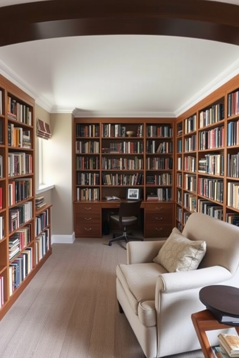 A cozy small home library with a small desk tucked in a corner. The walls are lined with floor-to-ceiling bookshelves filled with books, and a comfortable armchair is placed nearby for reading.