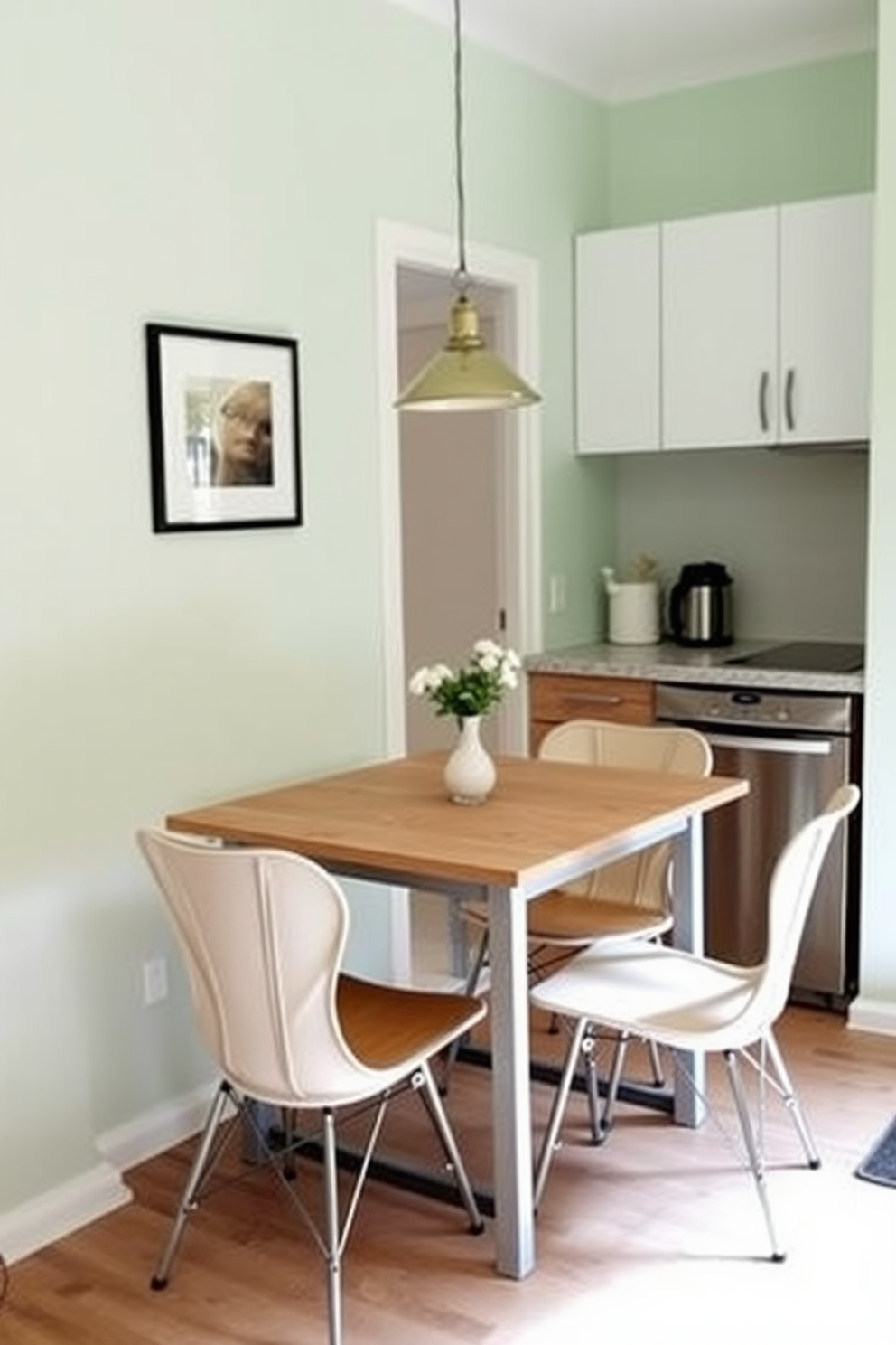 A cozy kitchen dining room featuring a sliding barn door that opens to a charming outdoor patio. The space includes a rustic wooden dining table surrounded by mismatched chairs, with pendant lighting hanging above for a warm ambiance. The walls are painted in a soft white, complemented by open shelving displaying colorful dishware. A small island with a butcher block top provides additional counter space, while potted herbs add a touch of greenery to the decor.