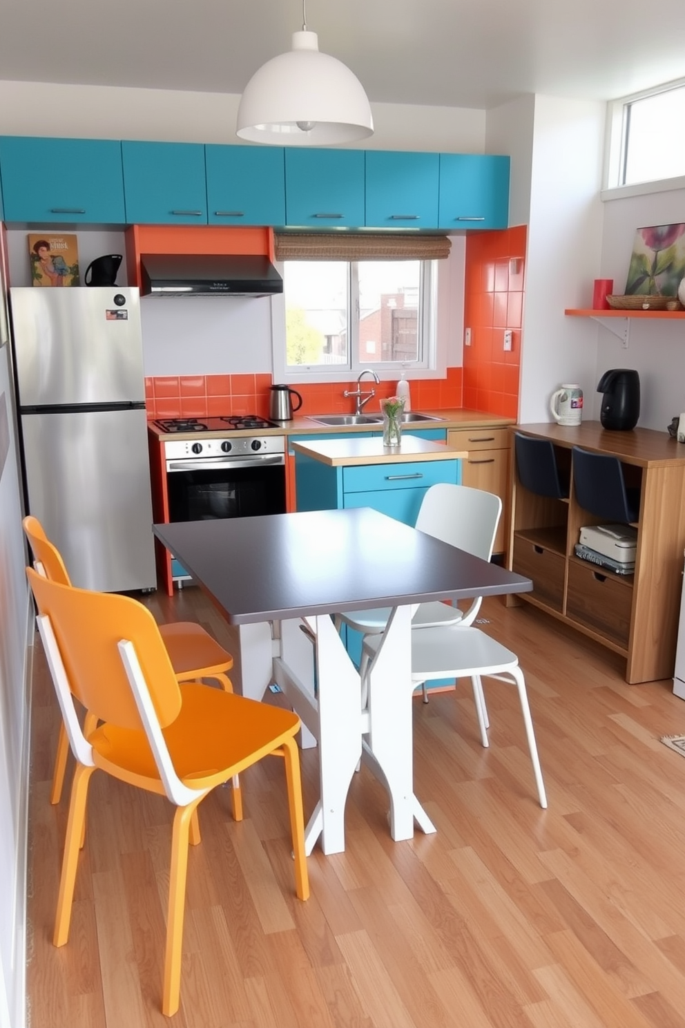 A small kitchen dining room features a sleek foldable table that can be expanded for guests. Surrounding the table are stackable chairs that can be neatly stored away when not in use. The kitchen area includes a compact island with built-in storage and seating for casual meals. Brightly colored cabinetry complements the space, creating a cheerful and inviting atmosphere.