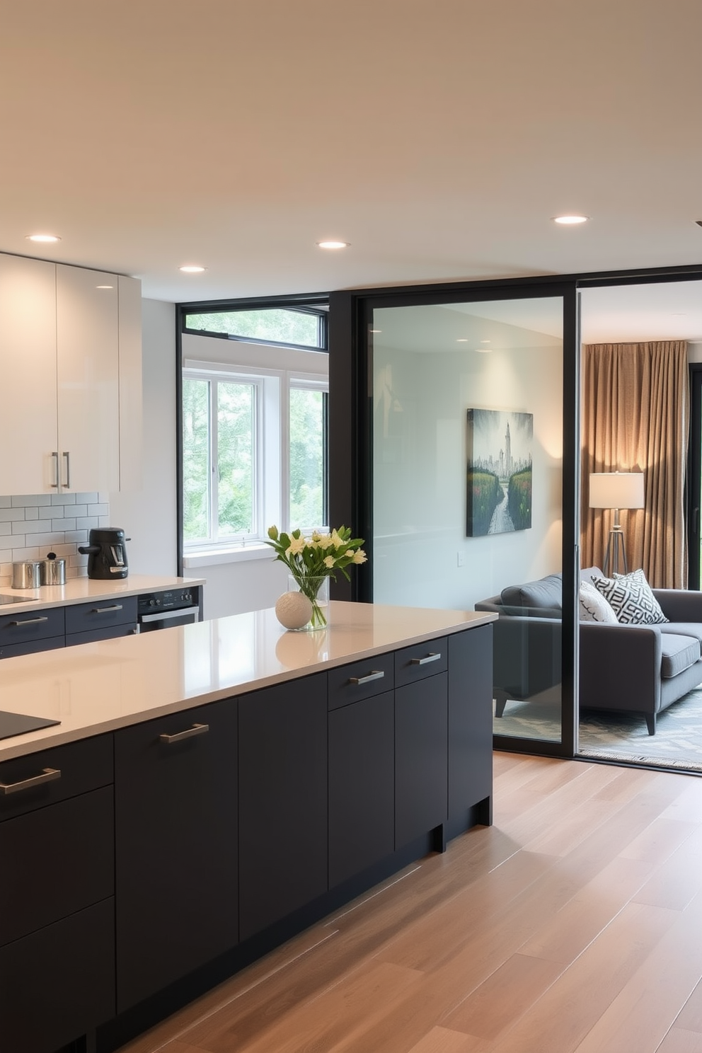 A minimalist kitchen seamlessly integrates with the living room, featuring sleek cabinetry and a compact island that doubles as a dining space. The color palette consists of soft whites and natural wood tones, creating an airy and inviting atmosphere. The living area showcases a simple yet elegant sofa paired with a glass coffee table, allowing for an unobstructed view of the kitchen. Large windows flood the space with natural light, enhancing the overall sense of openness and tranquility.