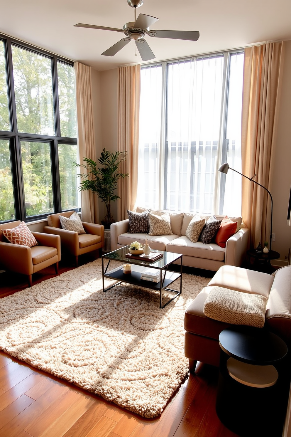 A cozy small living room featuring a plush area rug that defines the seating area. The rug is layered over hardwood floors, complementing a comfortable sofa and accent chairs arranged around a sleek coffee table. Natural light floods the space through large windows adorned with sheer curtains. A combination of warm colors and textured throw pillows adds a touch of warmth and personality to the room.