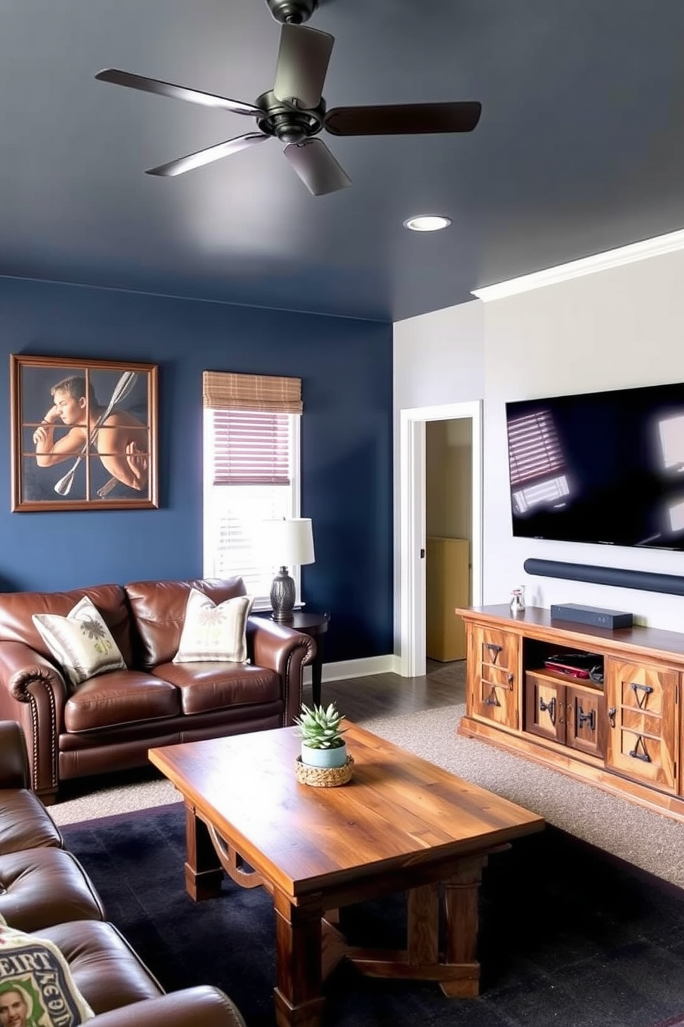 A cozy man cave featuring an accent wall painted in a bold navy blue. The space includes a comfortable leather sofa, a rustic coffee table, and a large flat-screen TV mounted on the opposite wall.