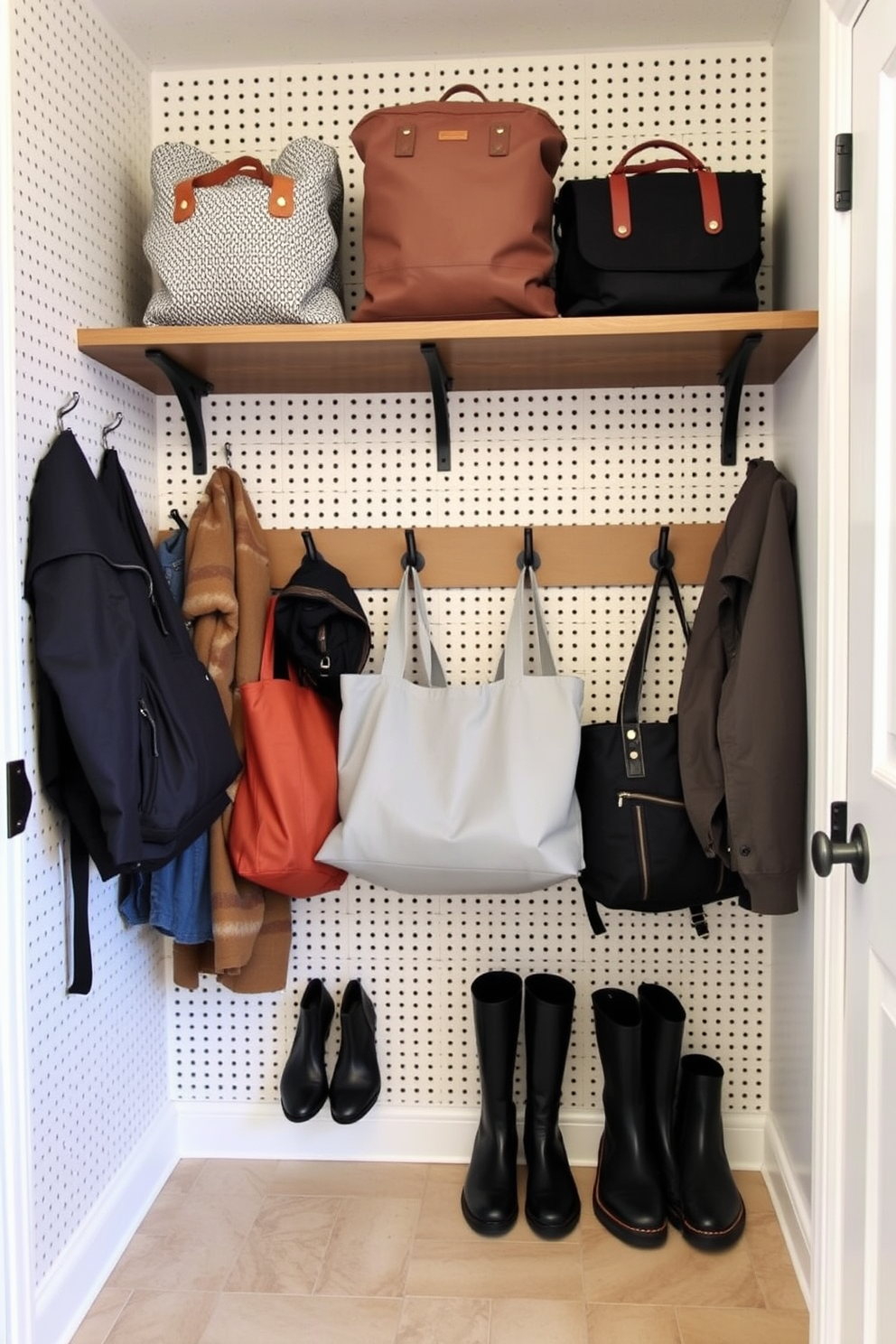 Textured wall panels create an inviting atmosphere in a small mudroom, enhancing the space with visual interest. The design features a combination of warm wood tones and soft neutral colors, complemented by stylish hooks for coats and bags. The flooring is a durable tile that mimics the look of natural stone, providing both functionality and elegance. A compact bench with built-in storage is positioned against the wall, offering a practical solution for shoes and accessories.