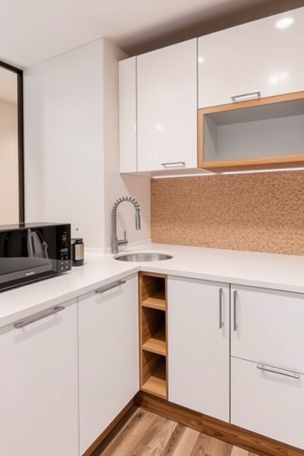 A small office kitchen design featuring a corner sink to maximize counter space. The cabinetry is sleek and modern with a combination of white and wood finishes, complemented by a stylish backsplash in a subtle pattern.