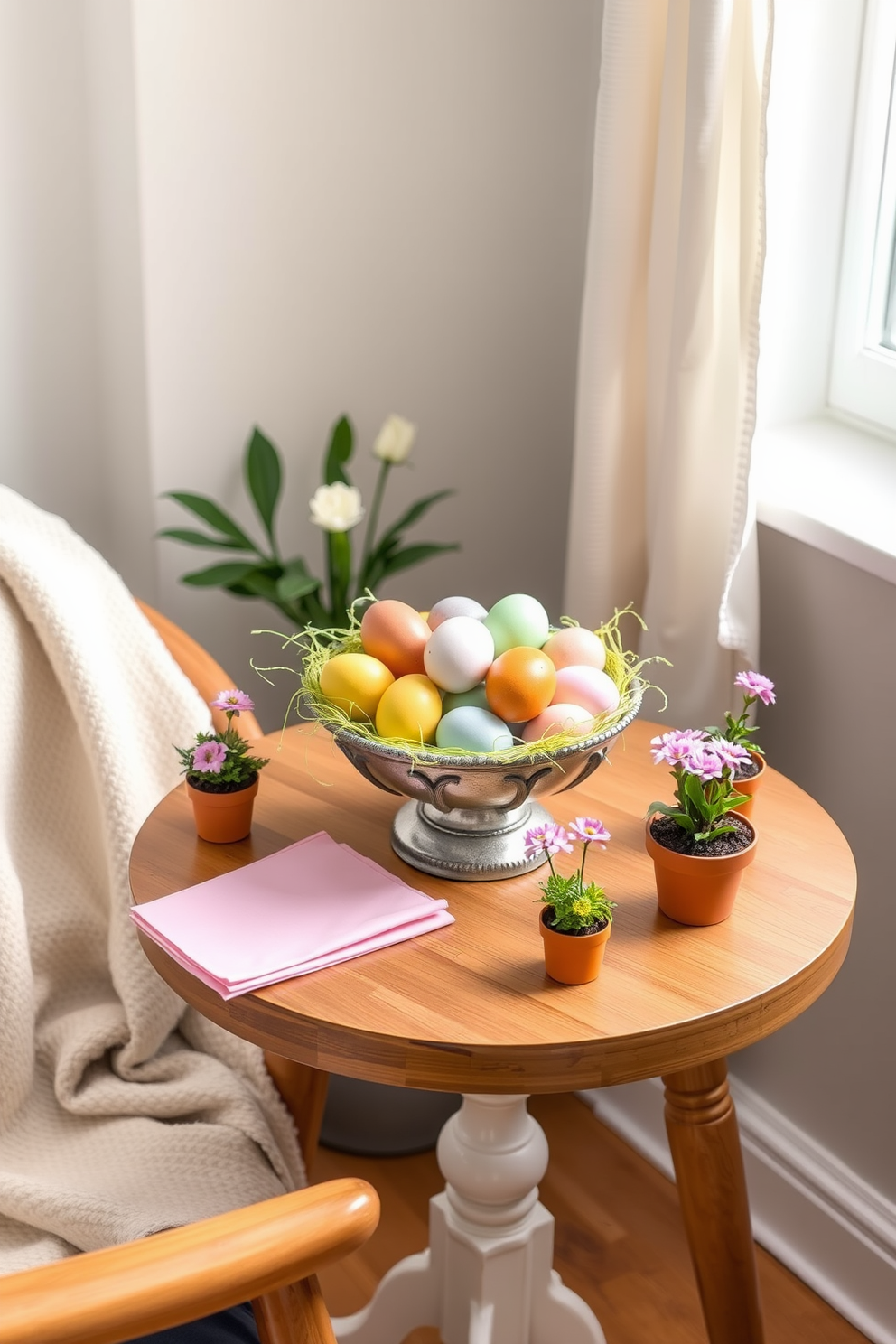 A decorative bowl filled with colorful Easter eggs sits on a small wooden table. Surrounding the bowl are pastel-colored napkins and small potted flowers, creating a cheerful spring atmosphere. The table is positioned in a cozy corner of the room, accentuated by a soft throw blanket draped over a nearby chair. Light streams in through a window adorned with sheer curtains, enhancing the inviting ambiance of the small space.