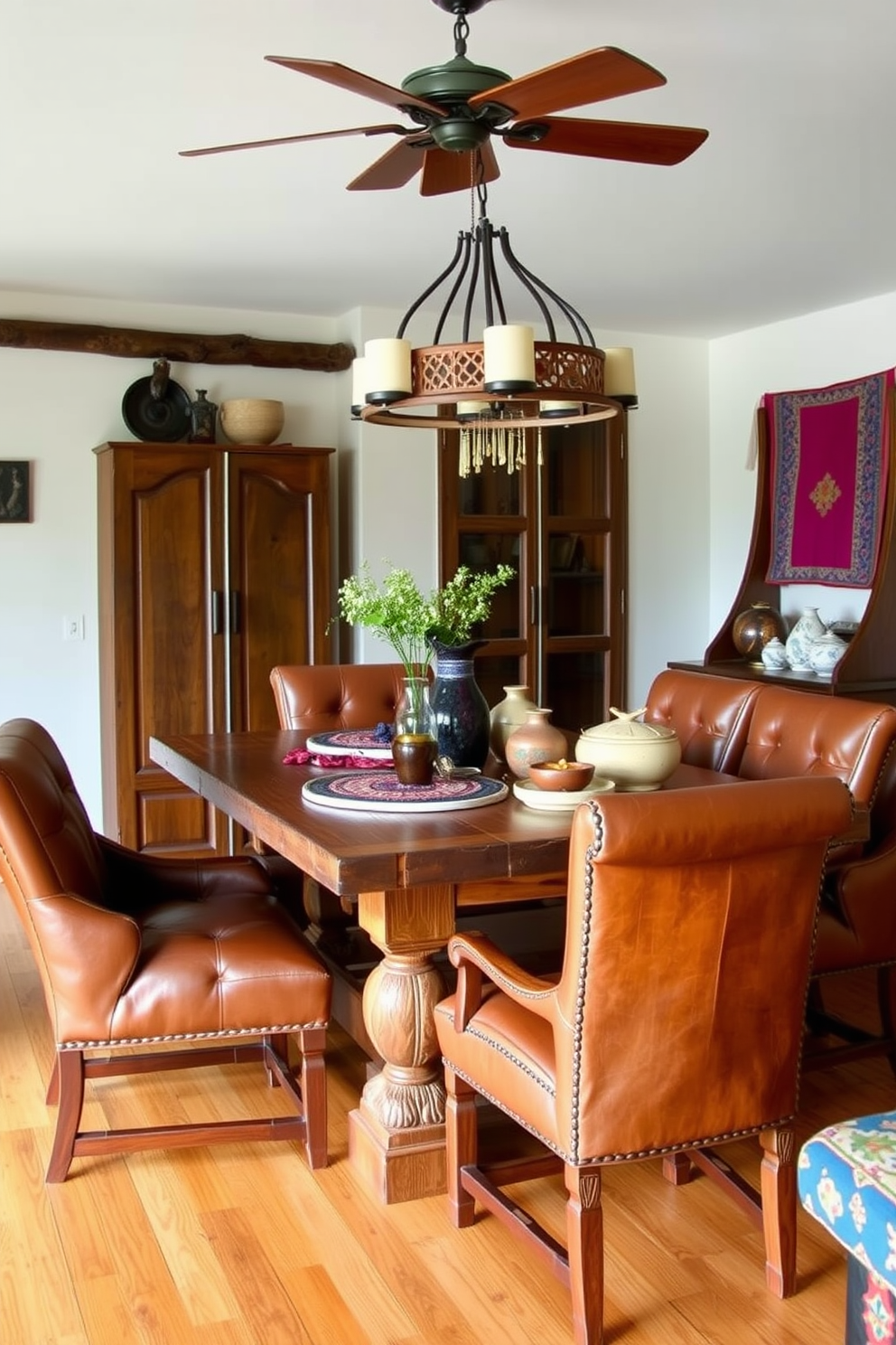 A warm and inviting dining room featuring framed southwestern art on the walls. The space is complemented by a rustic wooden dining table surrounded by colorful upholstered chairs. Natural light floods the room through large windows adorned with woven shades. A vibrant area rug anchors the space, adding texture and warmth to the southwestern aesthetic.