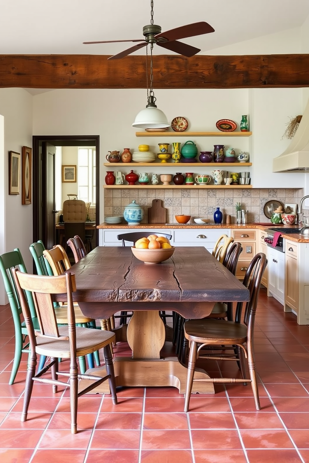 A rustic wooden dining table is surrounded by an eclectic mix of mismatched chairs that add character and warmth to the space. The kitchen features vibrant southwestern colors with terracotta tiles, hand-painted ceramic accents, and open shelving displaying colorful dishware.