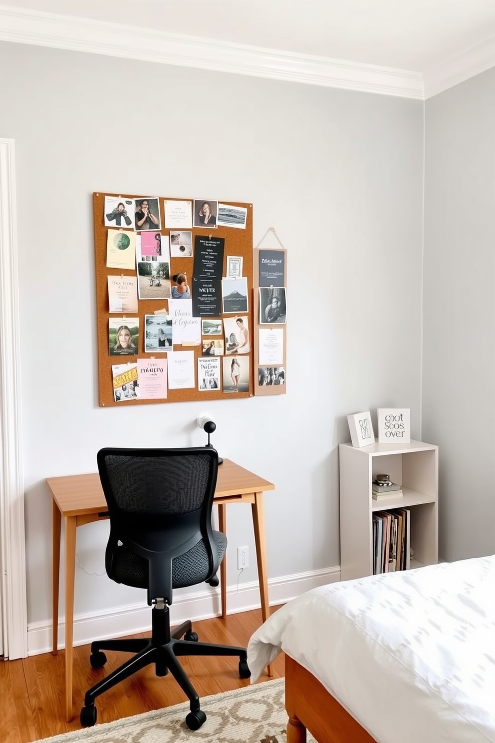 A chic bulletin board filled with inspiring images and notes is mounted on a light gray wall. Below the board, a sleek desk in a warm wood finish is paired with a comfortable ergonomic chair, creating an inviting workspace. The spare bedroom features soft pastel tones, with a cozy bed adorned with textured throw pillows. A stylish area rug anchors the space, while a small bookshelf holds curated decor and books, enhancing the room's charm.