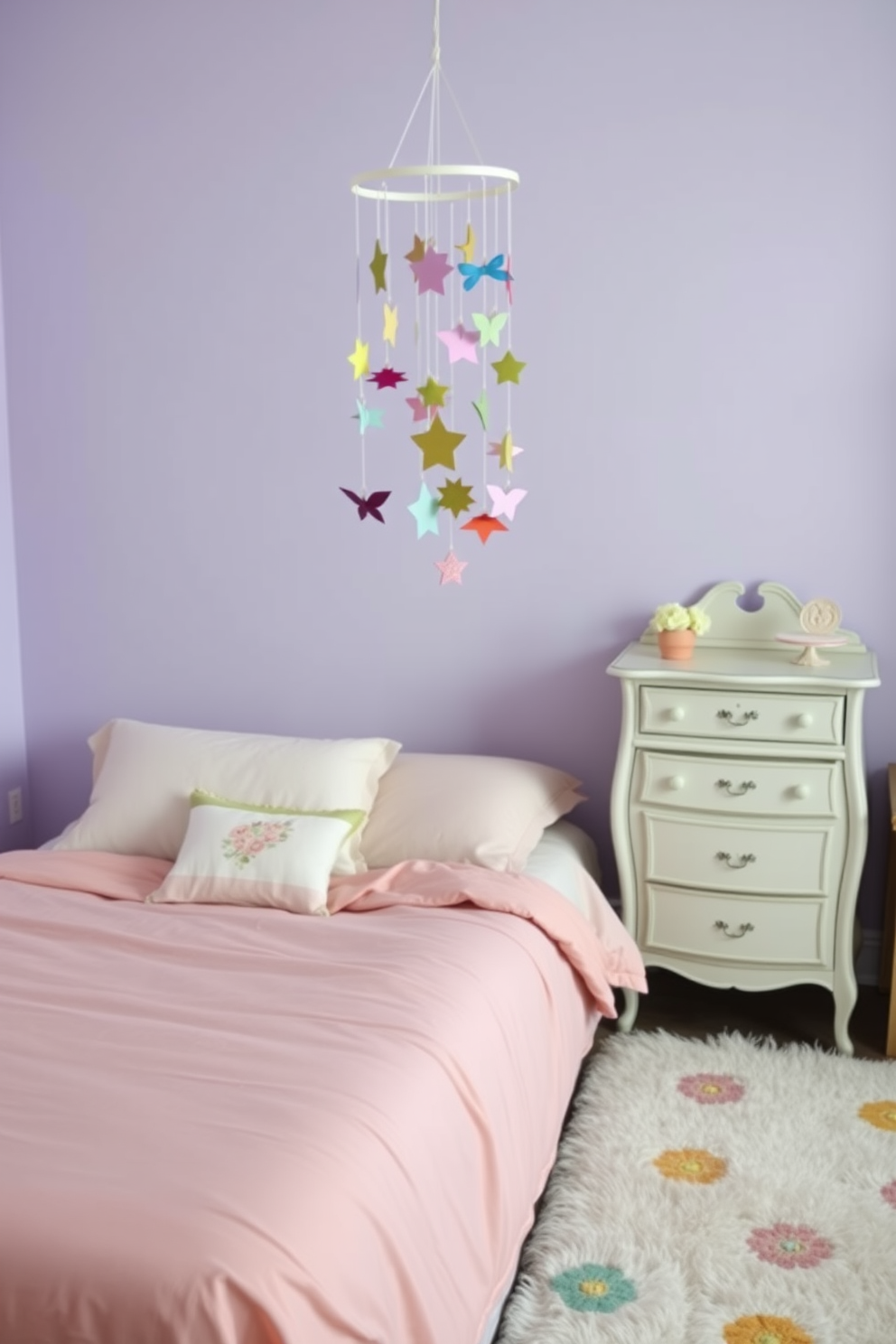 A whimsical bedroom setting featuring a cozy bed adorned with pastel-colored linens and fluffy pillows. Above the bed, a playful mobile made of colorful paper shapes gently sways, adding a touch of whimsy to the space. The walls are painted in a soft lavender hue, creating a serene atmosphere. A vintage dresser with delicate floral accents sits against one wall, complemented by a plush area rug in cheerful patterns.