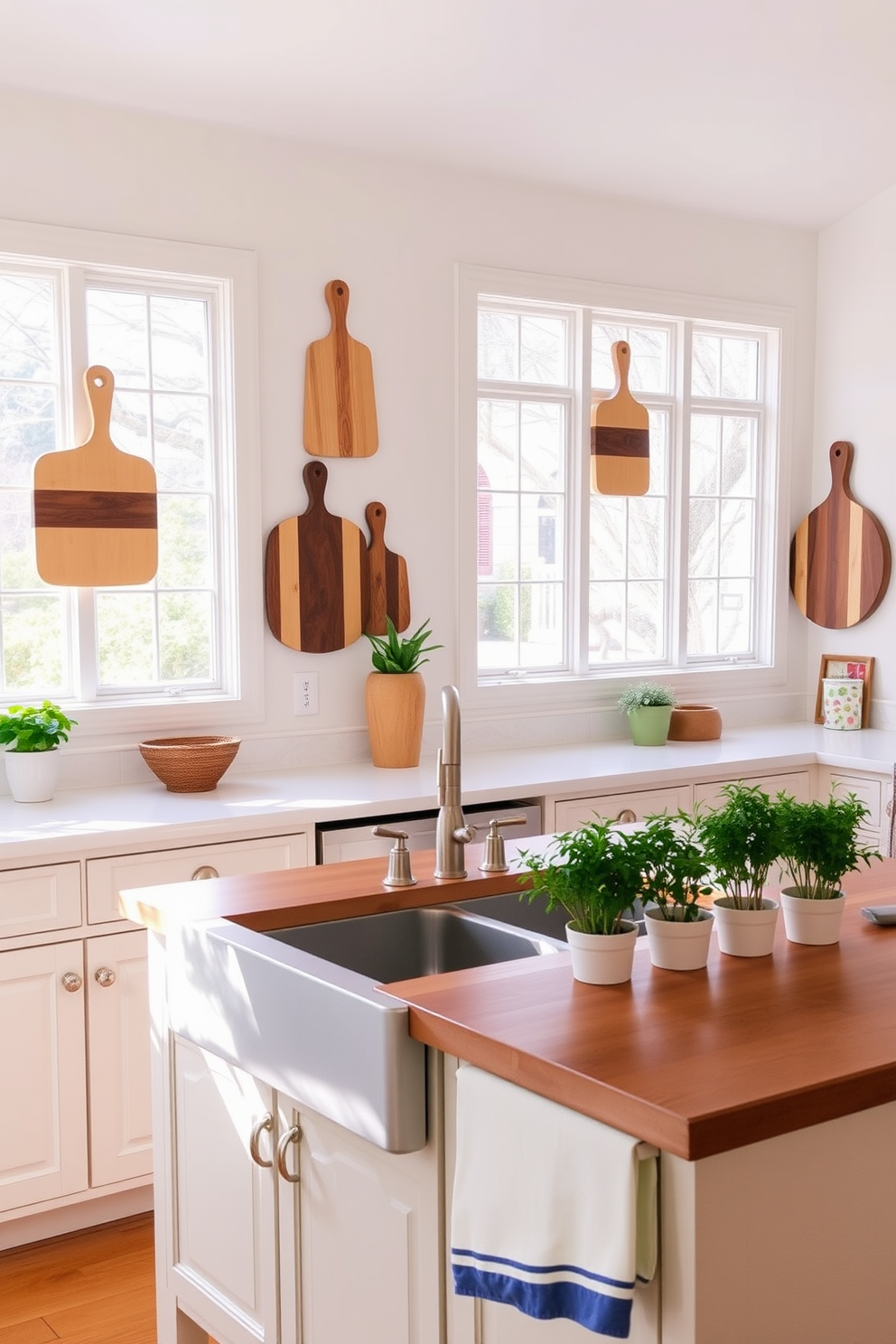 A bright and airy kitchen featuring decorative cutting boards mounted on the walls as unique art pieces. The boards are arranged in a visually pleasing pattern, showcasing various wood tones and shapes, complemented by fresh herbs in pots on the countertop. The kitchen has a farmhouse sink with a brushed nickel faucet and a wooden island in the center. Soft pastel colors adorn the cabinets, while natural light floods the space through large windows, creating a warm and inviting atmosphere.