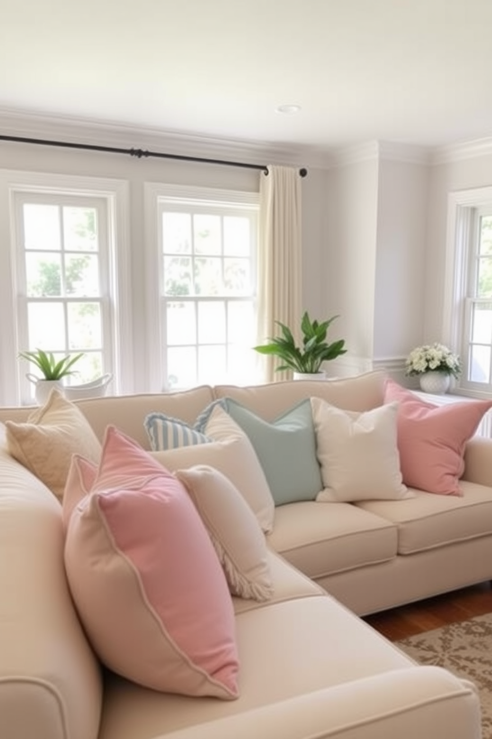 A bright and airy living room filled with natural light. The sofa is adorned with an array of pastel colored throw pillows in soft pinks, blues, and yellows, creating a cheerful and inviting atmosphere.