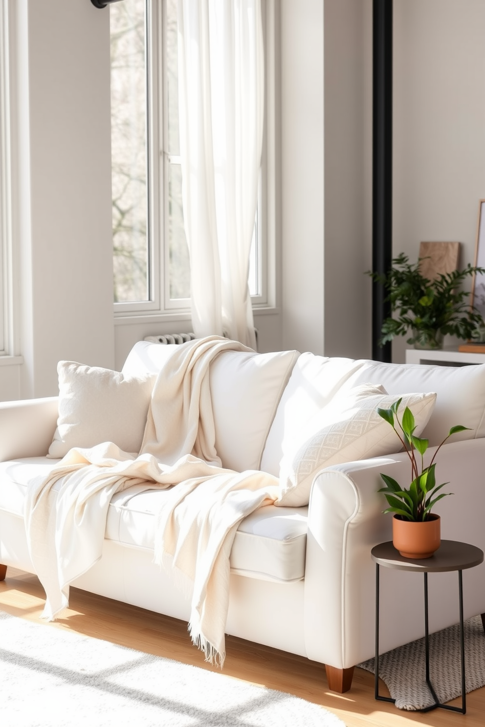 A bright and airy loft space filled with natural light. The living area features a plush sectional sofa adorned with colorful throw pillows and a large abstract painting on the wall. In the corner, a stylish coffee table sits atop a soft area rug, surrounded by potted plants for a fresh touch. A cheerful welcome mat at the entrance invites guests into this vibrant and inviting atmosphere.