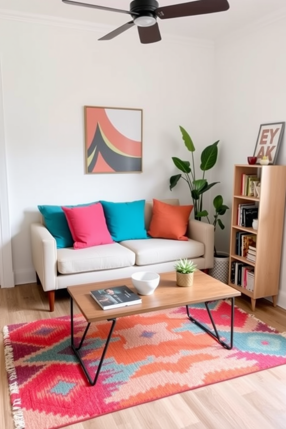 A cozy living room featuring a small sofa adorned with vibrant cushions in shades of teal and coral. The walls are painted a soft white, and a stylish coffee table sits in front, complemented by a colorful area rug that ties the space together. To maximize functionality, a compact bookshelf is placed against one wall, filled with books and decorative items. A potted plant in the corner adds a refreshing touch of greenery, enhancing the inviting atmosphere of the small space.