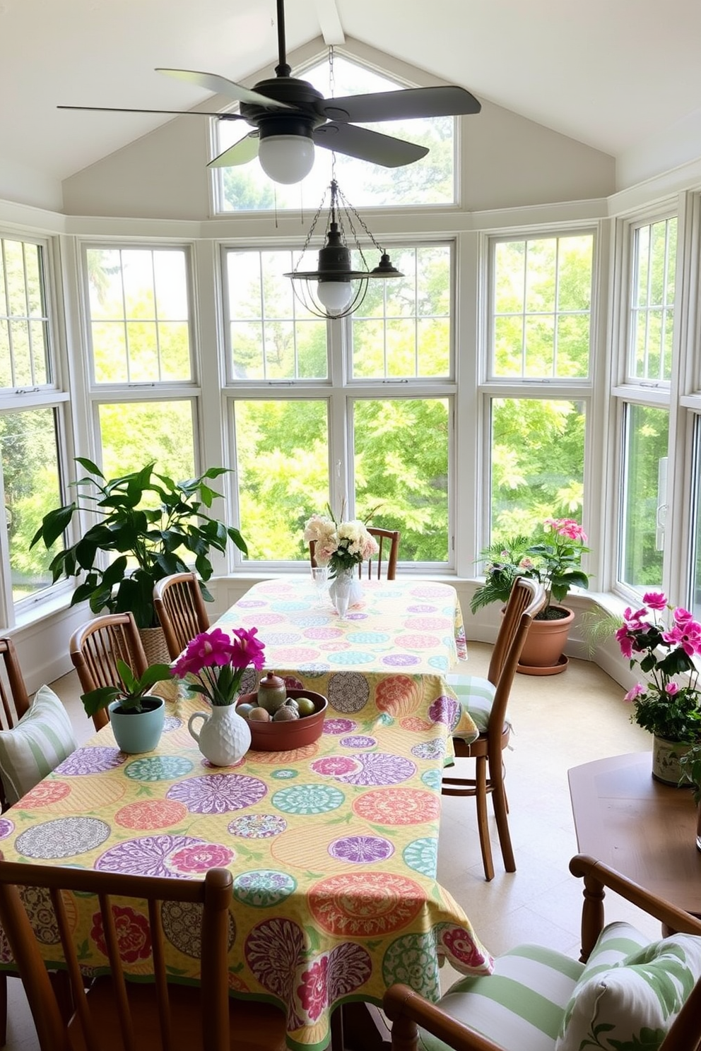 A bright and airy sunroom filled with natural light. There's a stylish side table made of rattan beside a comfortable lounge chair, adorned with a small potted plant and a stack of colorful books. The walls are painted in a soft pastel hue, complementing the greenery outside. Large windows draped with sheer white curtains provide a seamless connection to the outdoors, enhancing the tranquil atmosphere.