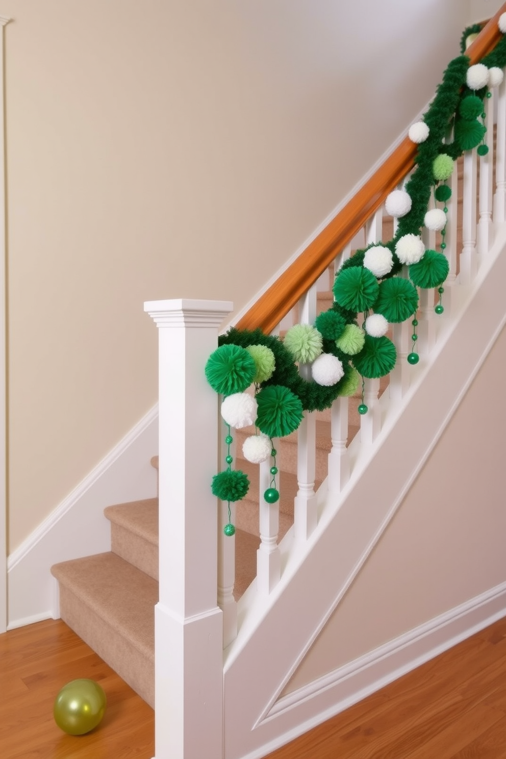 A charming staircase adorned with green and white pom pom decorations cascading down the banister. The walls are painted in a soft cream, creating a warm backdrop for the festive St. Patrick's Day accents.