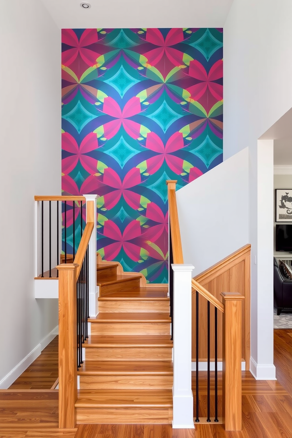 A striking staircase with a colorful accent wall behind it serves as the focal point of the family room. The wall features a bold geometric pattern in vibrant hues, complementing the warm wood tones of the staircase railing and treads.