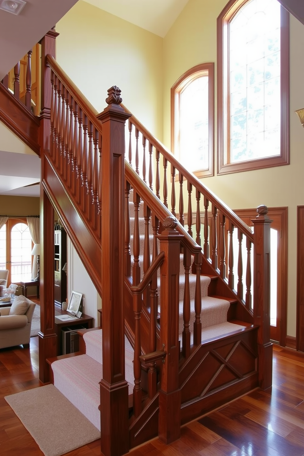 A beautifully designed staircase with built-in bookshelves seamlessly integrated underneath. The family room features a warm color palette with cozy seating and natural light streaming in through large windows.