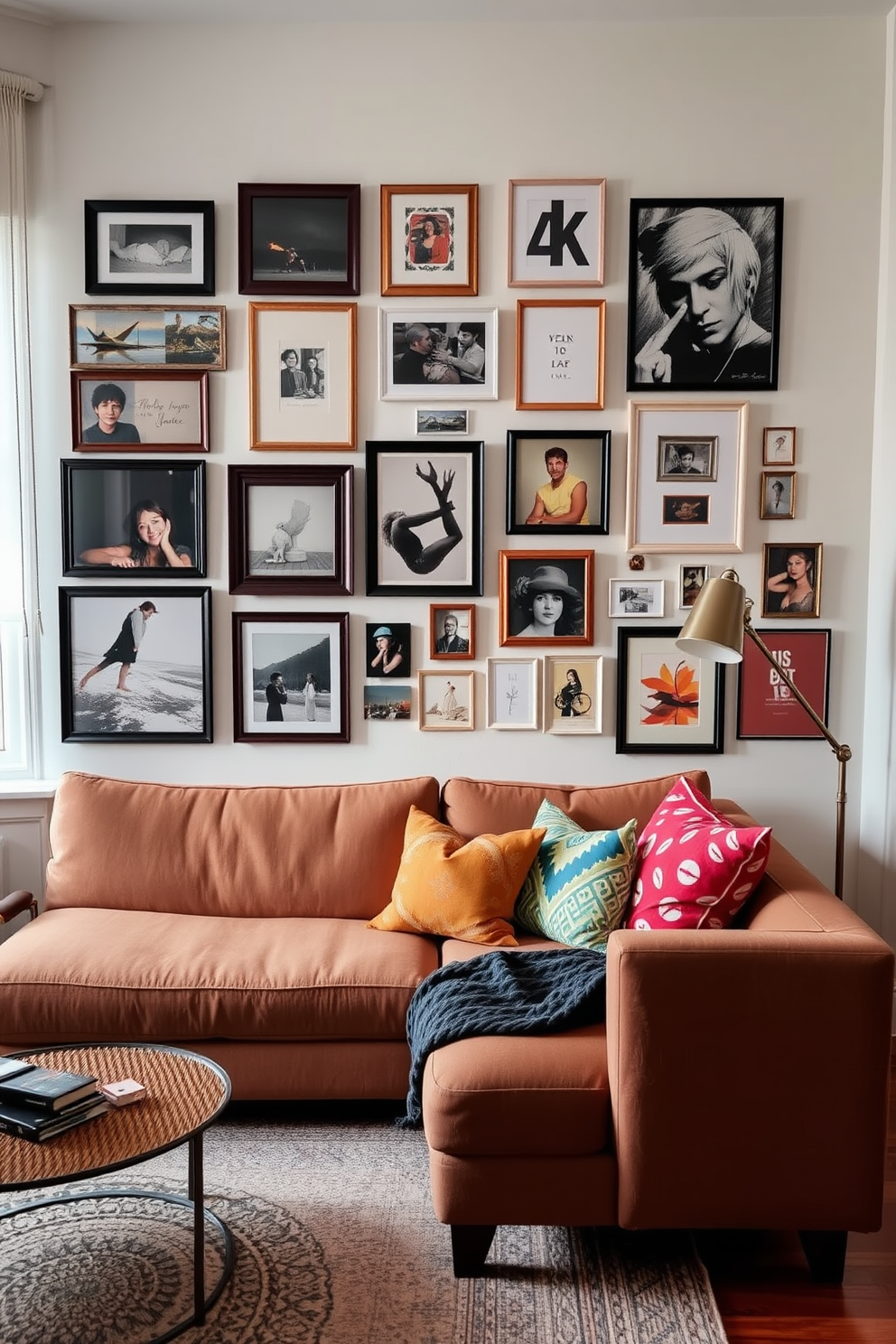 A stylish studio living room featuring a cozy seating area with a plush sectional sofa adorned with colorful throw pillows. The walls showcase a gallery wall filled with an eclectic mix of framed art, photographs, and personal mementos that add character and warmth to the space.