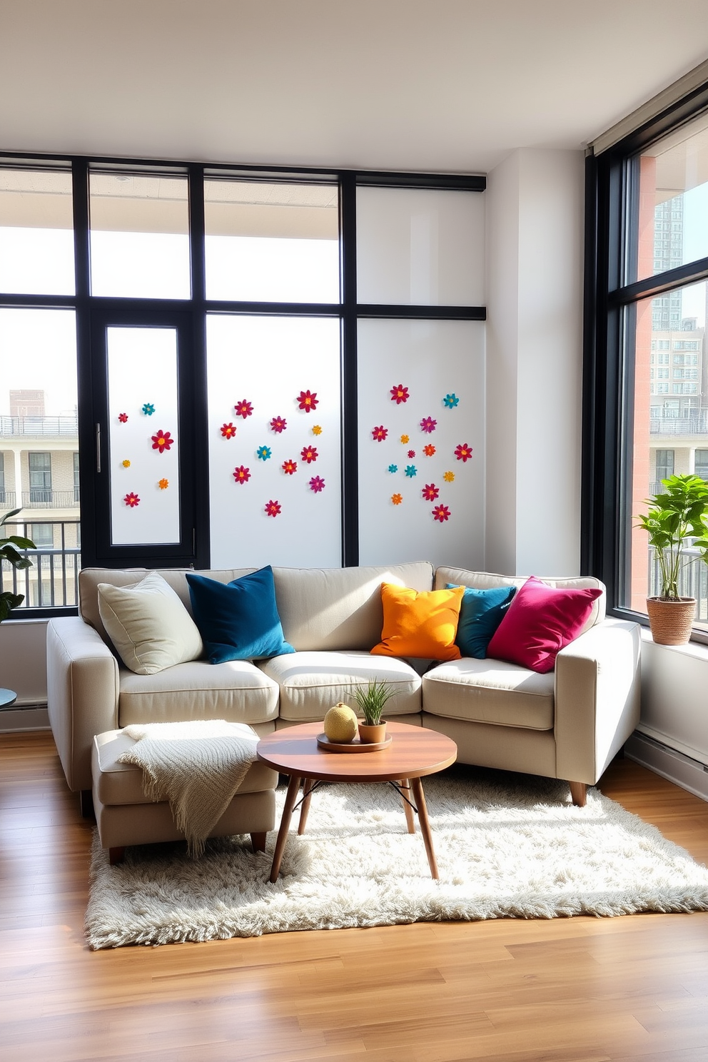 A stylish studio living room features open shelving that showcases a curated collection of books, plants, and decorative objects. The walls are painted in a soft neutral tone, while a plush sectional sofa invites relaxation and conversation.