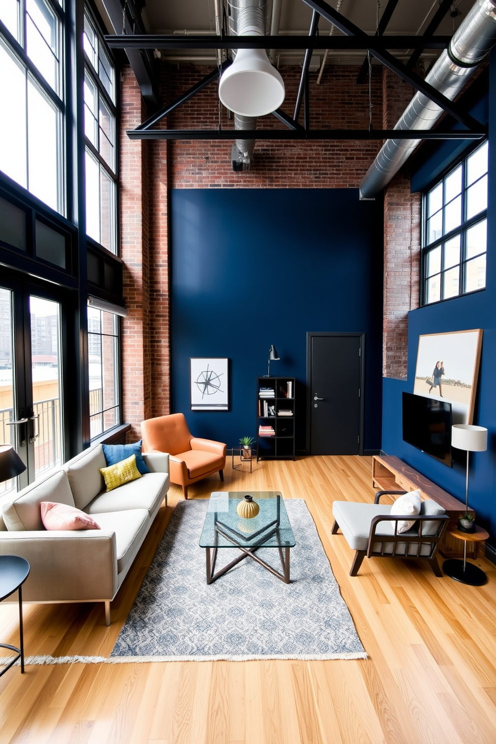 A studio loft apartment features a bold accent wall painted in deep navy blue that contrasts beautifully with the light wood flooring. The open space is filled with modern furniture, including a sleek sofa and a glass coffee table, creating a stylish yet inviting atmosphere. Large windows allow natural light to flood the room, highlighting the industrial-style elements such as exposed brick and metal beams. A cozy reading nook is created with a plush armchair and a small bookshelf, adding a touch of warmth to the contemporary design.