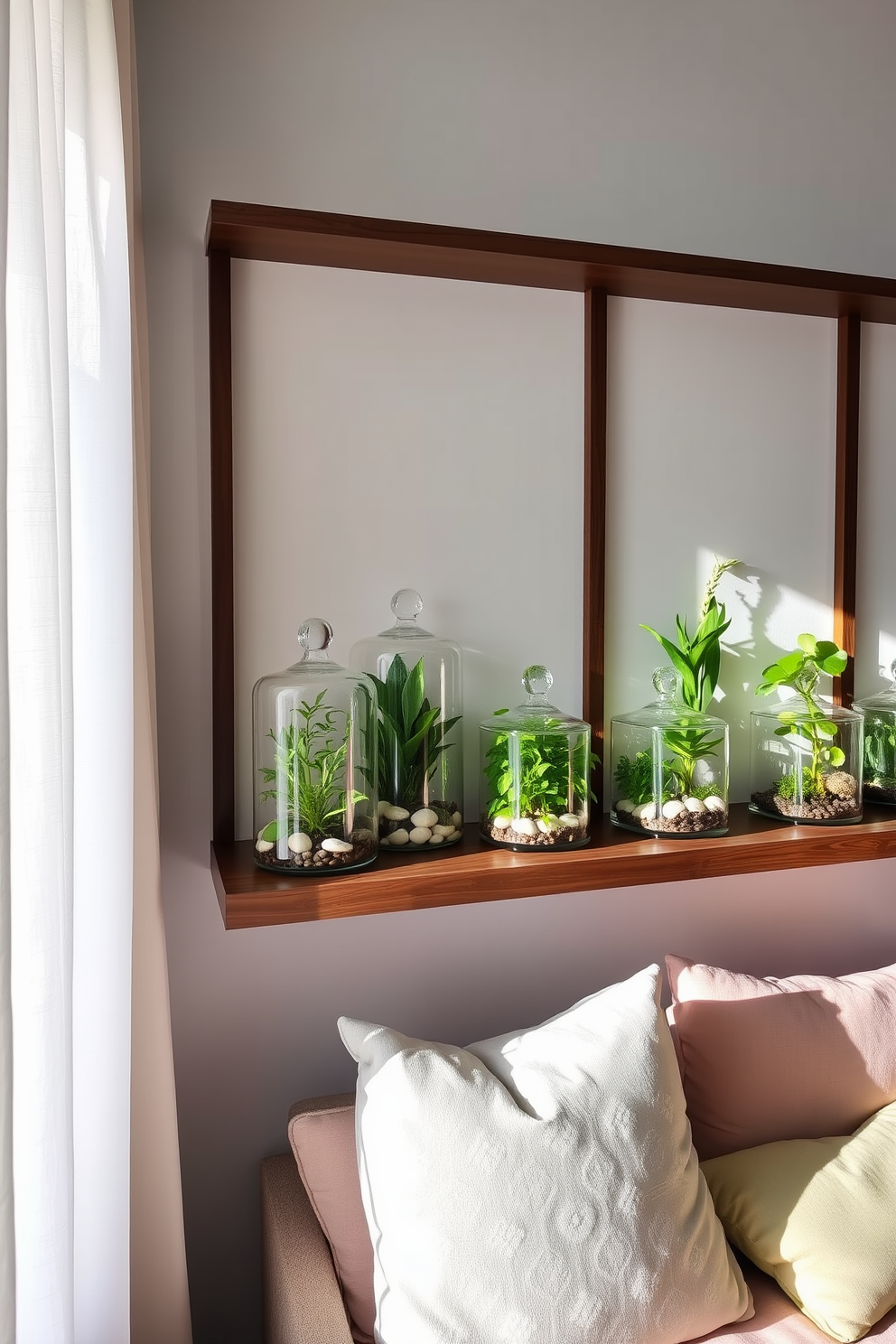 A collection of glass terrariums filled with vibrant greenery sits on a sleek wooden shelf. Each terrarium is uniquely designed with different plants and decorative stones, creating a lively focal point in the room. Bright and airy summer apartment decorating ideas feature light linen curtains that flutter in the breeze. A cozy seating area with pastel-colored cushions invites relaxation and enjoyment of the warm sunlight.