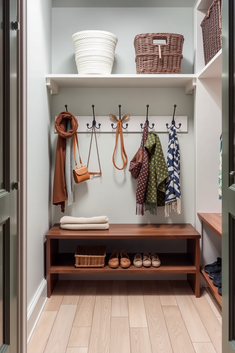 A stylish summer closet featuring decorative hooks for displaying accessories. The walls are painted in a soft pastel color, and the floor is adorned with a light wooden finish.