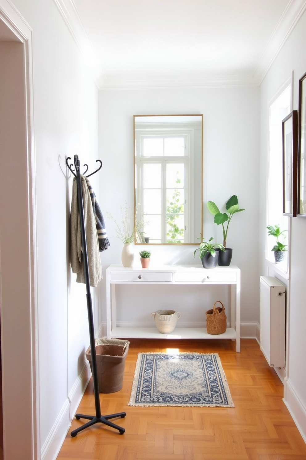 A stylish coat rack is positioned against the wall in a bright and airy hallway. The space is adorned with light-colored walls and a warm wooden floor, creating a welcoming atmosphere. A large mirror hangs above a console table, reflecting natural light that streams in through a nearby window. Decorative elements such as potted plants and framed artwork add a personal touch to the decor.