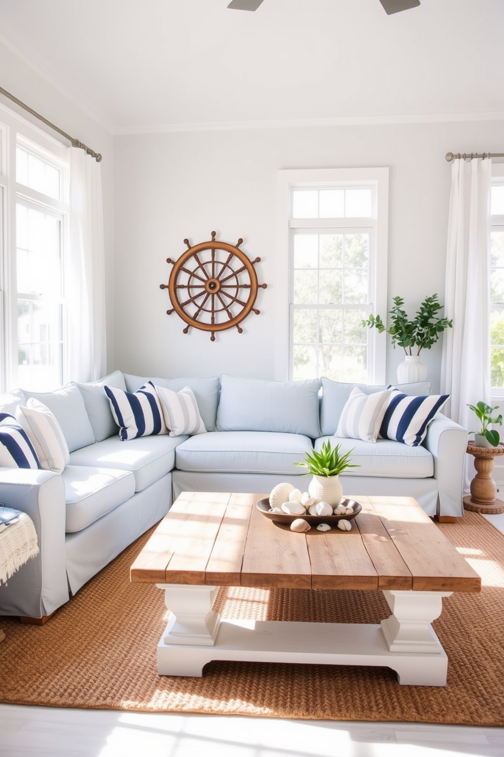 A bright and airy summer living room features a light blue sectional sofa adorned with white and navy striped cushions. Nautical elements are incorporated through decorative items such as a ship wheel on the wall and a jute area rug that mimics the texture of sand. Natural light floods the space through large windows dressed with sheer white curtains. A coffee table made of reclaimed wood is topped with a collection of seashells and a small potted plant, adding a touch of coastal charm.