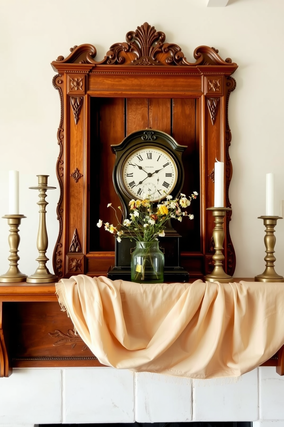 A charming summer mantel decorated with a collection of vintage antiques. The mantel features an ornate wooden frame adorned with delicate carvings, and a pair of antique candlesticks stand proudly on either end. In the center, a weathered clock adds a touch of nostalgia, while a small bouquet of fresh wildflowers in a rustic vase brings a pop of color. Soft, flowing fabric drapes gracefully over the mantel, enhancing the warm, inviting atmosphere of the room.