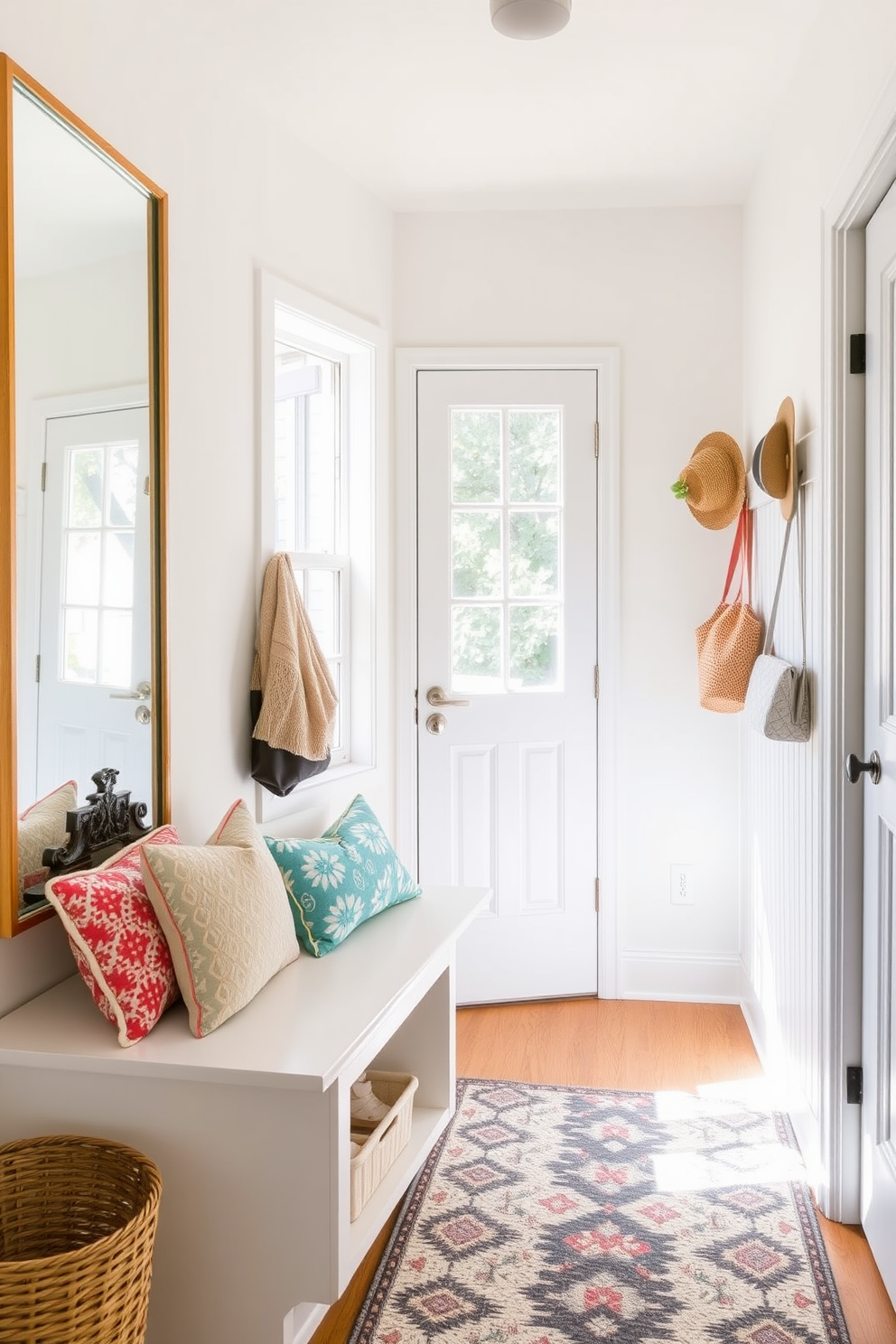 A bright and airy mudroom filled with natural light. The space features a large mirror on one wall that reflects the sunlight streaming in through a nearby window. The walls are painted in a soft pastel hue, and the floor is adorned with a stylish patterned rug. A bench with colorful cushions sits against one side, while hooks for hanging summer hats and bags line the opposite wall.