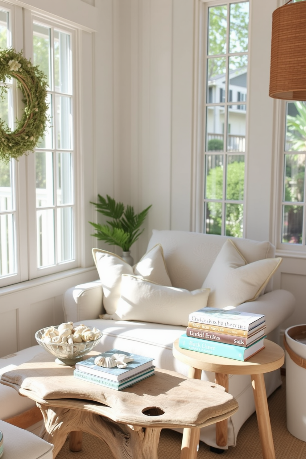 A cozy summer reading nook filled with beach-themed decor. Soft pastel colors dominate the space with a comfortable oversized chair adorned with seashell-patterned cushions. Natural light floods in through large windows, illuminating a small side table made of driftwood. A collection of beach-themed books is stacked on the table, accompanied by a decorative bowl filled with seashells.