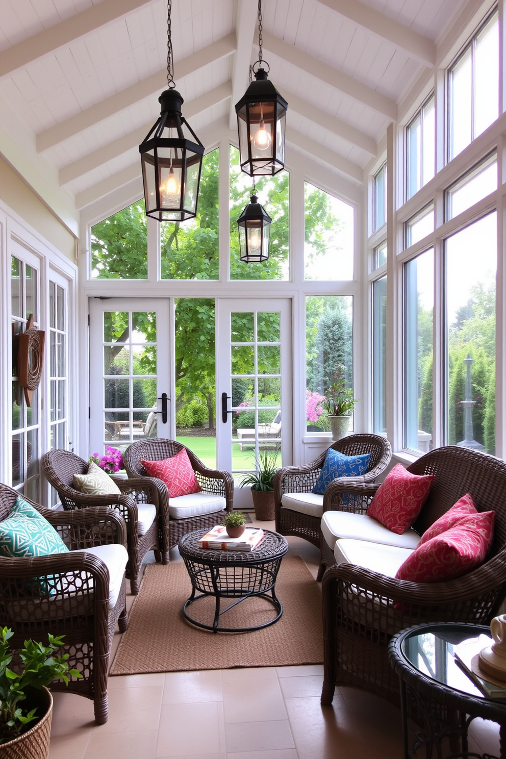 A bright and airy sunroom filled with natural light. The space features comfortable wicker furniture adorned with colorful cushions, creating a cozy retreat. Large glass doors open to a lush garden, seamlessly blending indoor and outdoor living. Outdoor-inspired lanterns hang from the ceiling, casting a warm glow in the evening.