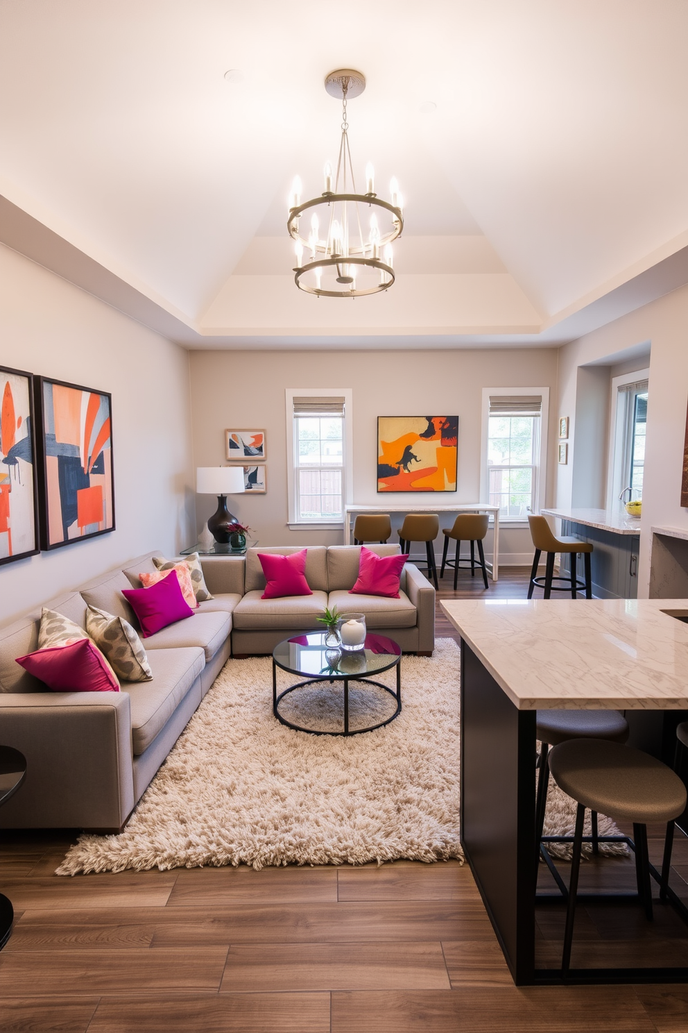 A stylish sunken living room featuring a cozy sectional sofa in a soft gray fabric, complemented by vibrant throw pillows. The space is illuminated by a modern chandelier hanging from the ceiling, while a sleek wet bar with a marble countertop and high-backed stools is situated in one corner for entertaining guests. The walls are adorned with abstract art pieces that add a pop of color, and large windows allow natural light to flood the room. A plush area rug anchors the seating area, creating a warm and inviting atmosphere perfect for relaxation and social gatherings.