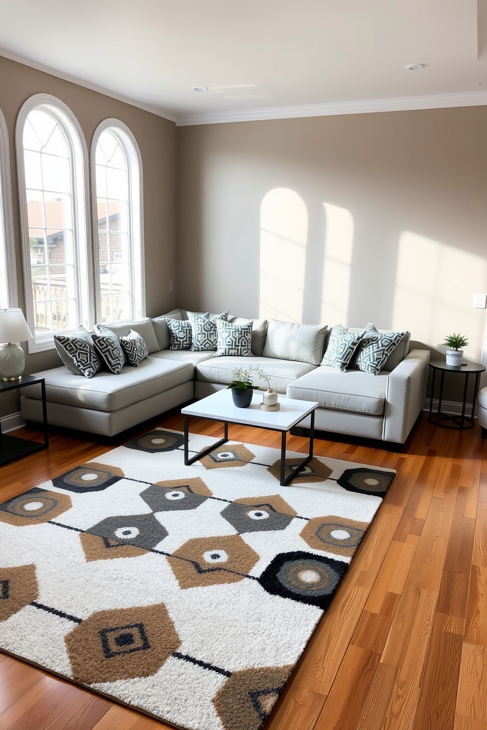 A sunken living room features a sleek sectional sofa in a neutral tone, surrounded by geometric patterned throw pillows that add a modern touch. The flooring is a polished hardwood, with a large area rug showcasing bold geometric designs, creating a cozy yet stylish atmosphere.