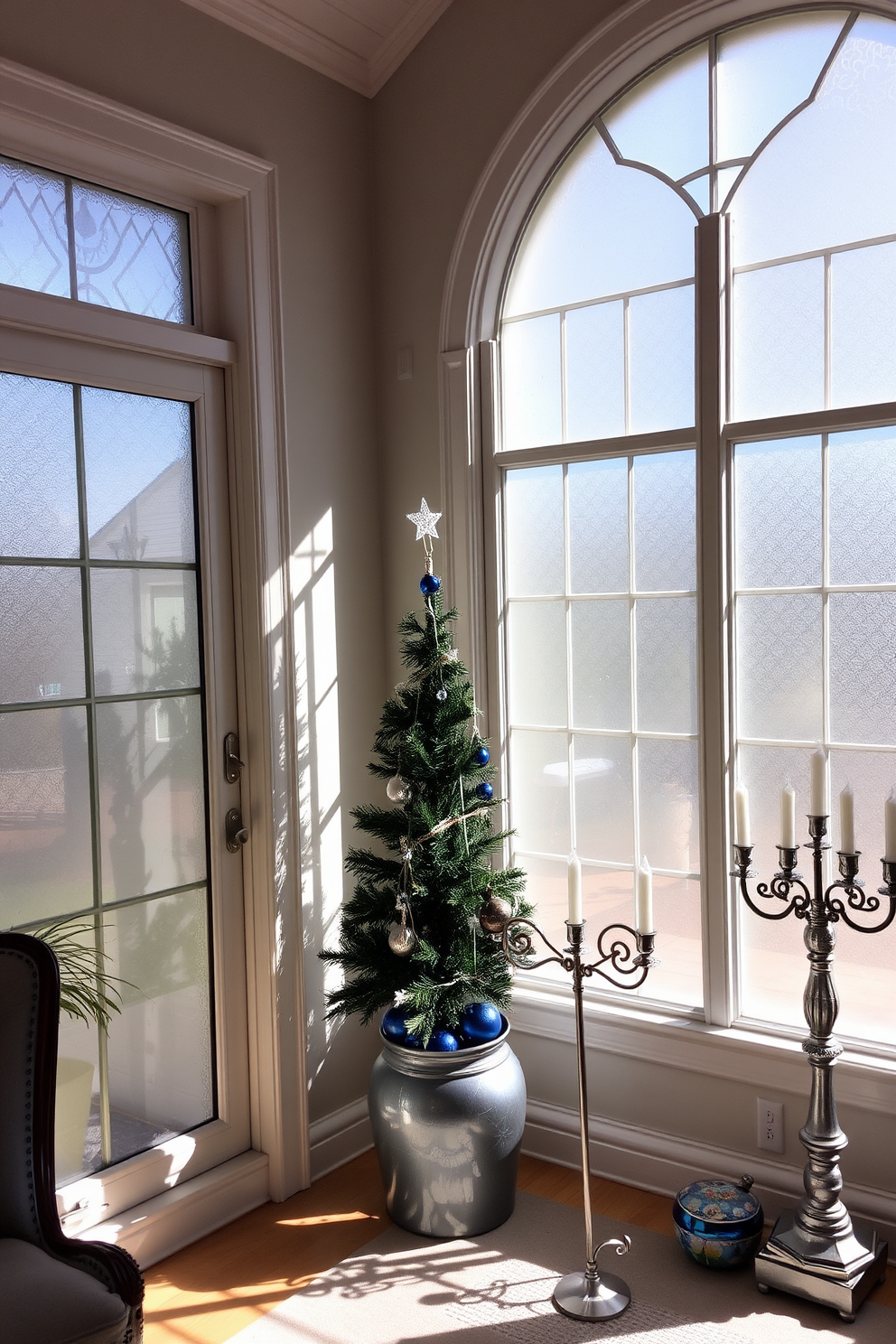 Seasonal scented candles are arranged on a rustic wooden table in the sunroom. The warm glow from the candles creates a cozy atmosphere, complemented by plush seating and vibrant greenery. For Hanukkah, the sunroom is adorned with blue and silver decorations. A beautifully set table features a menorah at the center, surrounded by festive ornaments and seasonal accents.