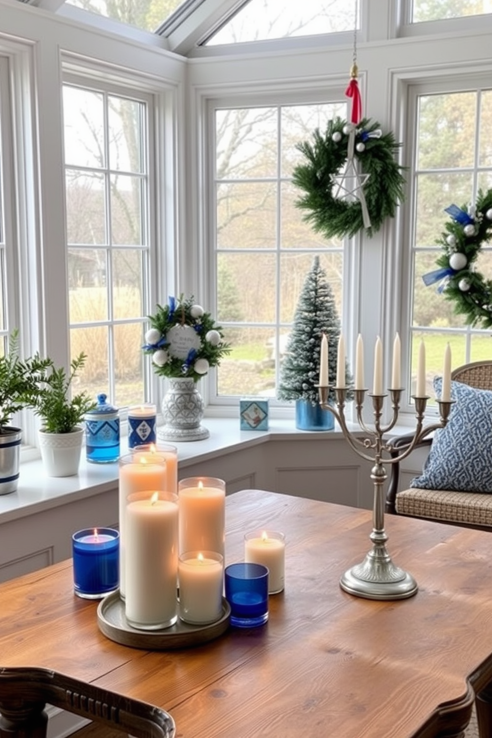 A cozy sunroom filled with natural light. Seasonal scented candles are arranged on a rustic wooden table, creating a warm ambiance. The space is adorned with festive Hanukkah decorations. Blue and silver accents are used throughout, including a beautiful menorah placed prominently on the windowsill.