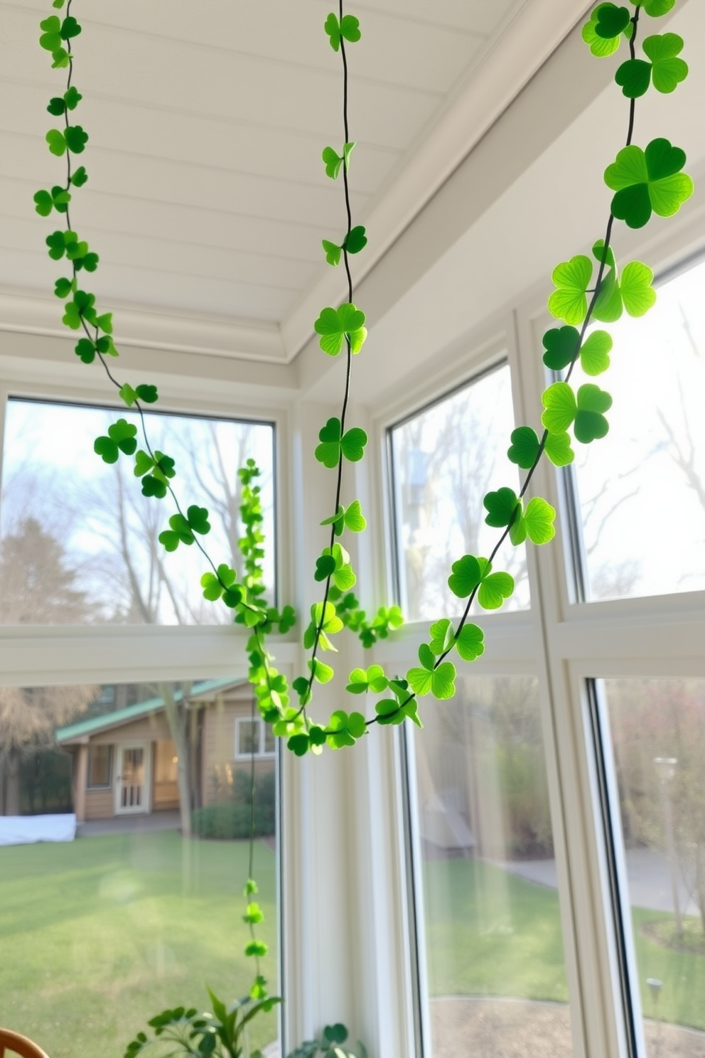 Shamrock garlands hang gracefully from the ceiling, adding a festive touch to the sunroom. The bright green hues of the garlands complement the natural light streaming in through the large windows, creating a cheerful atmosphere for St. Patrick's Day celebrations.