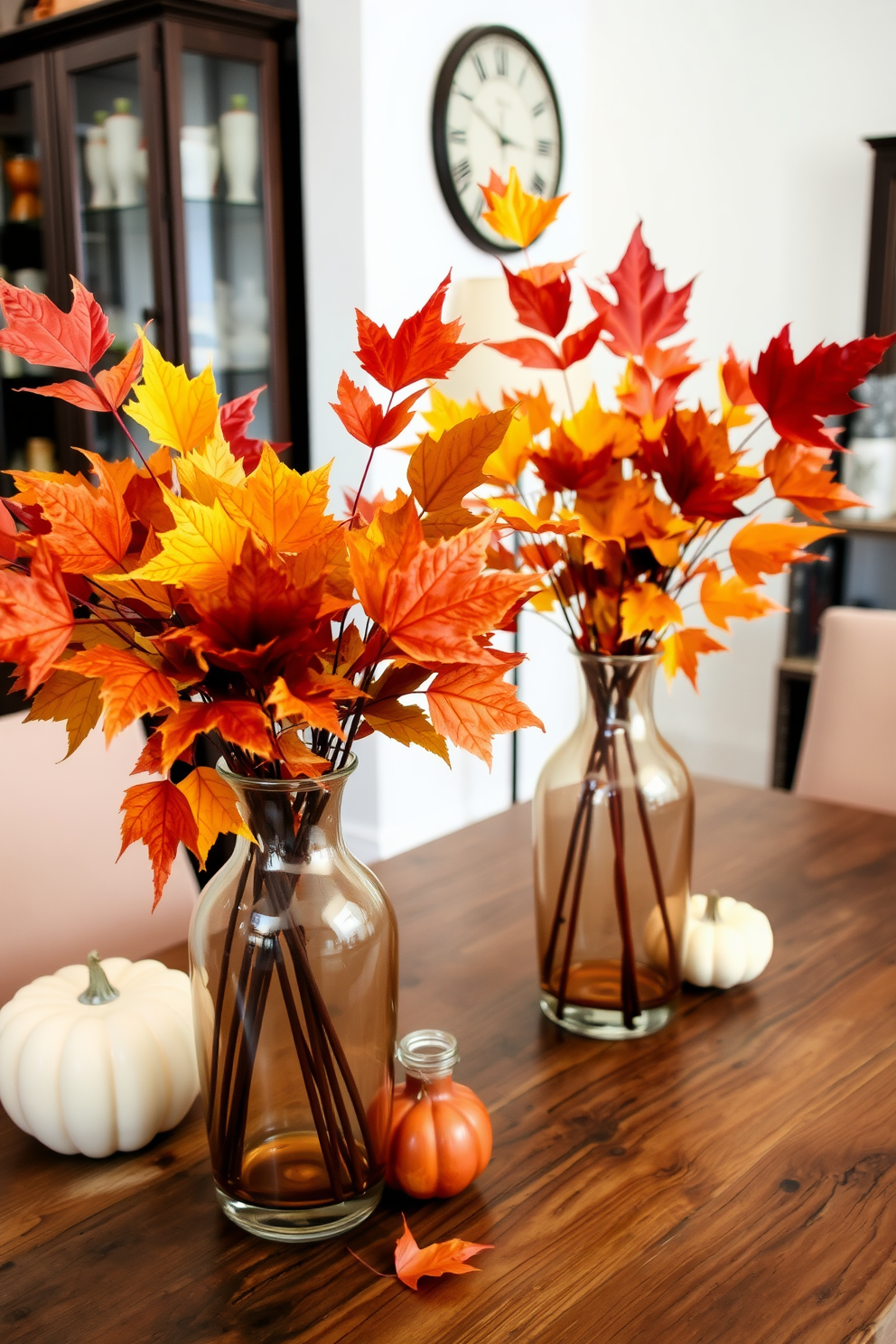 A cozy apartment living room featuring layered rugs in warm tones. The base rug is a large neutral-colored piece, while a smaller, colorful patterned rug is placed on top to create depth and texture. Decorative throw pillows in autumn hues are scattered across a plush sofa. A wooden coffee table adorned with seasonal decor completes the inviting Thanksgiving atmosphere.