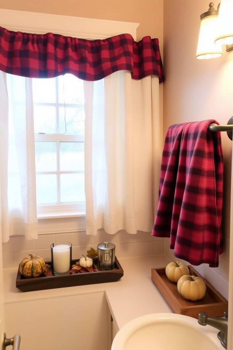 A warm and inviting bathroom adorned with flannel fabric accents. Soft flannel curtains frame a window, while plush flannel towels hang neatly on a rack, adding a cozy touch for the Thanksgiving season. The countertop is decorated with seasonal elements such as small pumpkins and autumn leaves. A scented candle in a rustic holder sits beside a wooden tray, creating a welcoming atmosphere for guests.