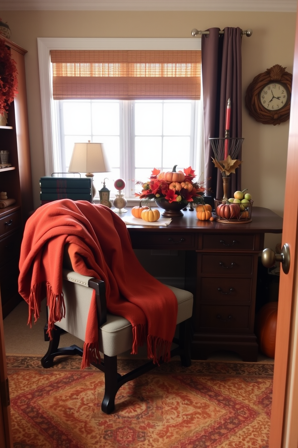 A warm and inviting home office featuring a comfortable chair draped with cozy throw blankets in rich autumn colors. The desk is adorned with seasonal decorations, including small pumpkins and a festive centerpiece, creating a welcoming atmosphere for Thanksgiving.