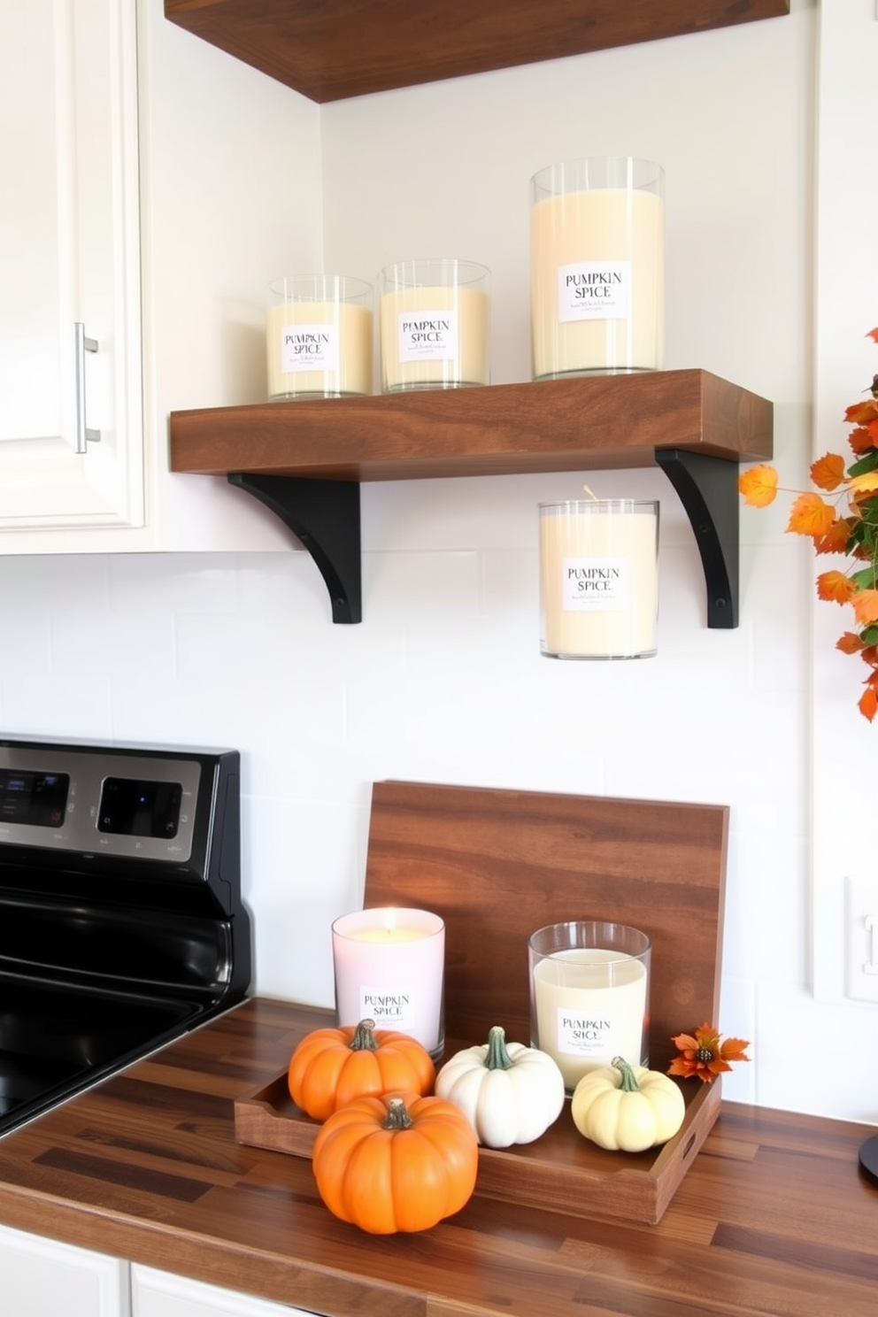 A warm and inviting kitchen adorned with pumpkin spice scented candles placed on open wooden shelves. The decor features autumn-themed accents like small pumpkins and fall leaves, creating a cozy Thanksgiving atmosphere.