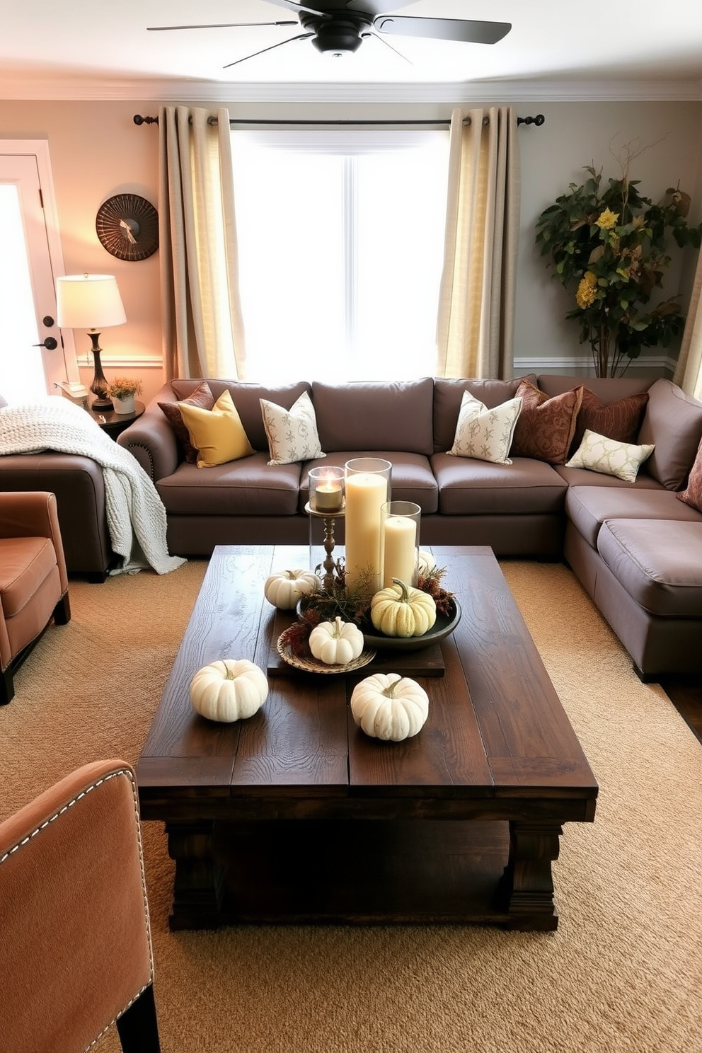 A cozy living room adorned for Thanksgiving features a warm color palette with deep oranges and rich browns. Glass jars filled with colorful leaves are artfully arranged on the coffee table, adding a touch of nature to the festive decor. Plush cushions in autumnal hues invite guests to relax on the comfortable sofa. A soft throw blanket drapes over the armrest, enhancing the inviting atmosphere of the space.