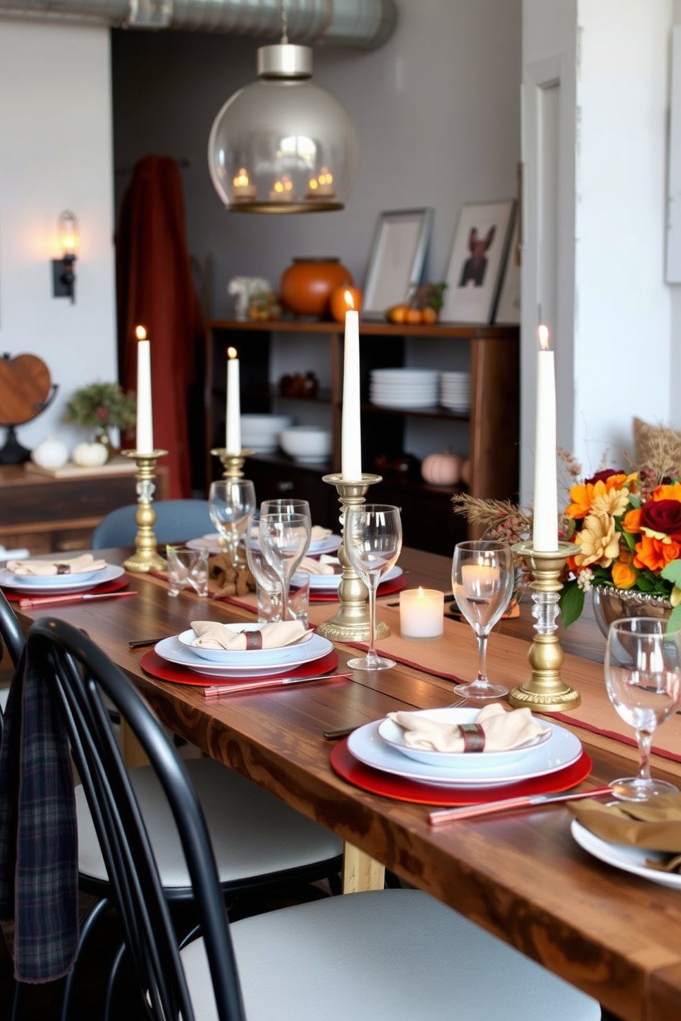 Artful arrangement of seasonal fruits in a rustic wooden bowl placed on a textured linen tablecloth. Surrounding the bowl are small decorative pumpkins and candles, creating a warm and inviting atmosphere for Thanksgiving. Loft decorating ideas feature exposed brick walls combined with sleek modern furniture. Large windows allow natural light to flood the space, highlighting a mix of vintage and contemporary decor elements.